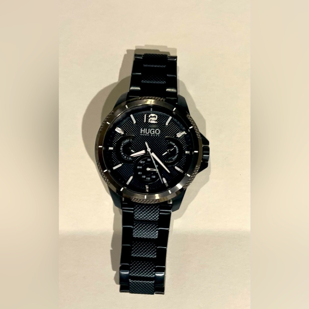 Selling this Authentic Hugo Boss Mens watch. Never used it. BRAND NEW make offer